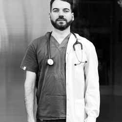 Headshot of a friendly-looking man, Ramon Valdez, the section editor.